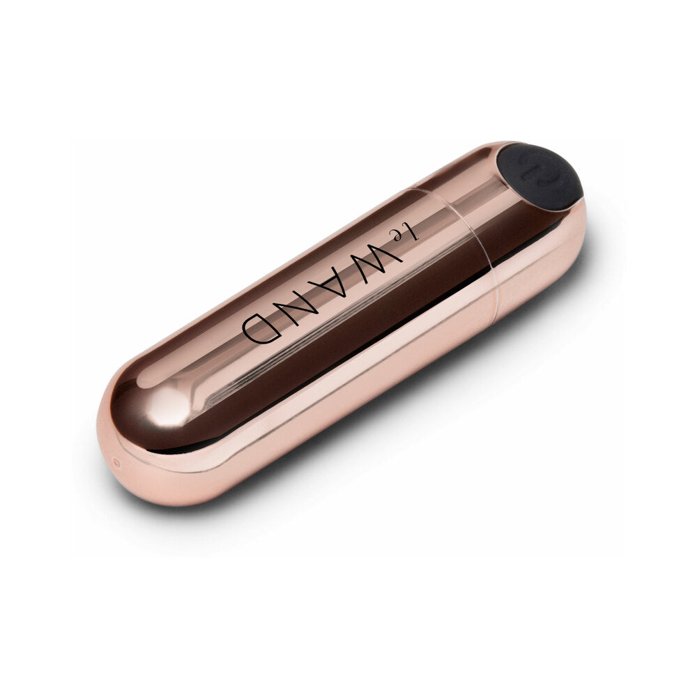Le Wand Essentials Mini Rose Gold Bullet Vibrator in sleek rose gold finish for targeted clitoral stimulation.
