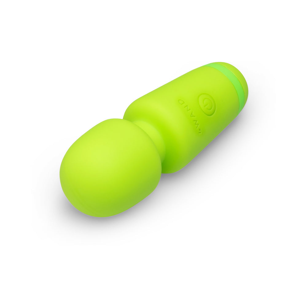 Le Wand Essentials Mini Wand Vibe Pocket-sized Vibrator in vibrant green color, perfect for discreet stimulation.