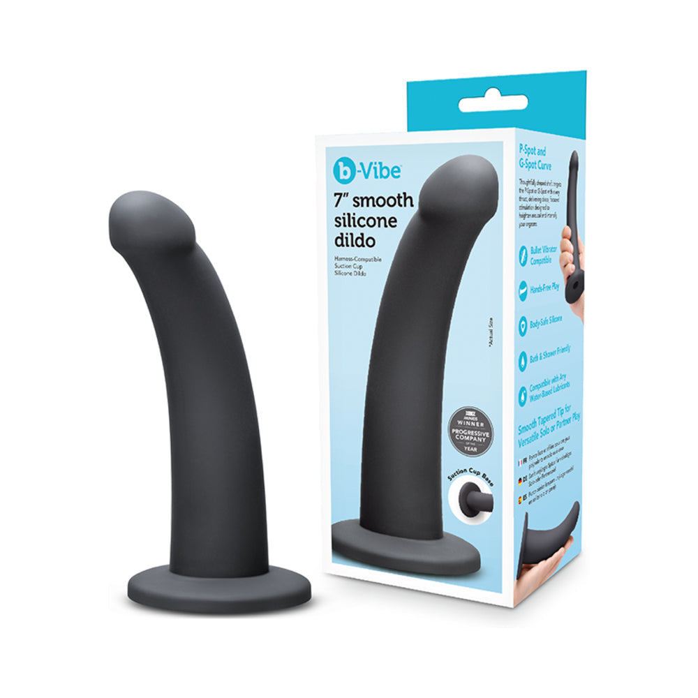 B-vibe Essentials 7 Inch Smooth Silicone Dildo Black with packaging showcasing its features and sleek design.