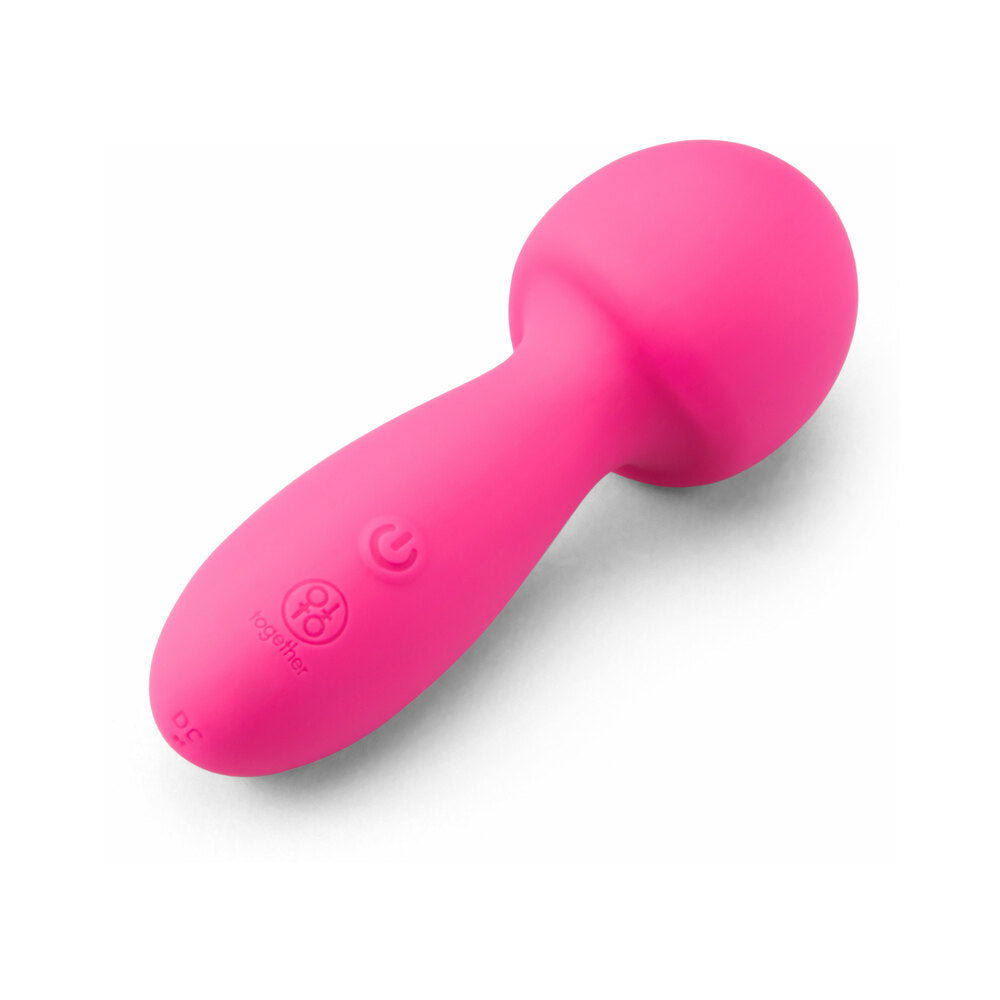 Together Spark On The Go Mini Wand Vibrator in vibrant pink color, compact design for pleasure and spontaneity.