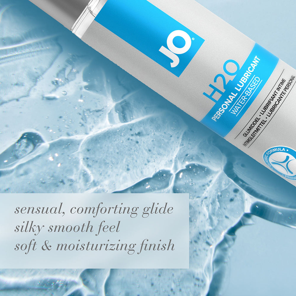 Jo H2o Original Water-based Lubricant 2 Oz bottle on a soft blue background with water droplets.