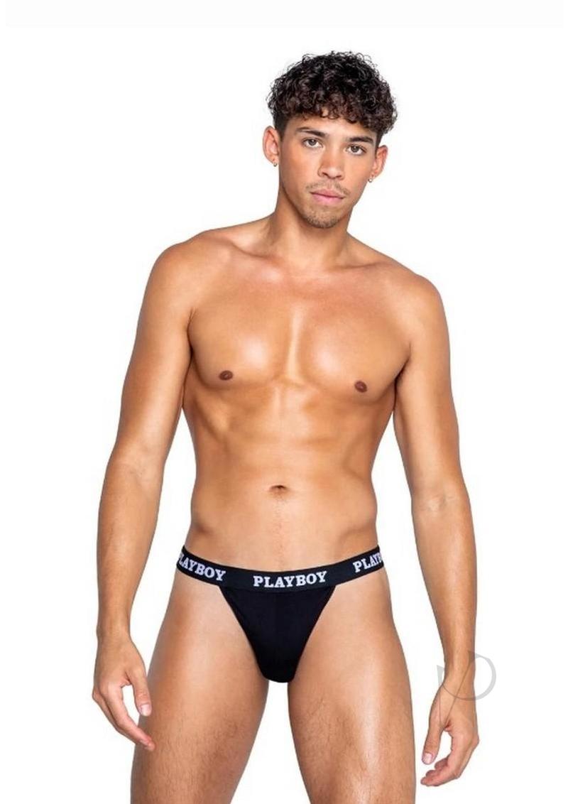 Playboy Mens Modal Gym Thong Medium Black and White worn by a male model, showcasing minimal thong design.