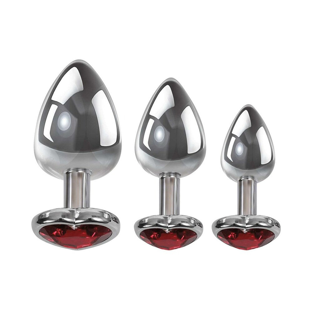 Adam & Eve Three Hearts Gem Anal Plug Set featuring three graduated aluminum plugs with red heart-shaped gems.
