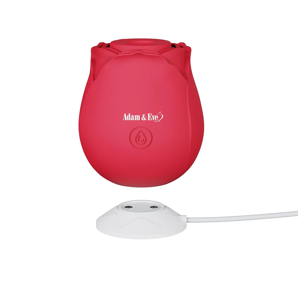 Adam & Eve Eve's Ravishing Suction Rose Clitoral Stimulator in vibrant red with charging base.