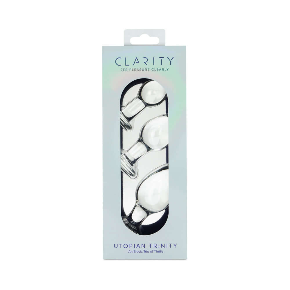 Clarity Utopian Trinity Glass Plug Set packaging featuring three glass butt plugs for progressive play.