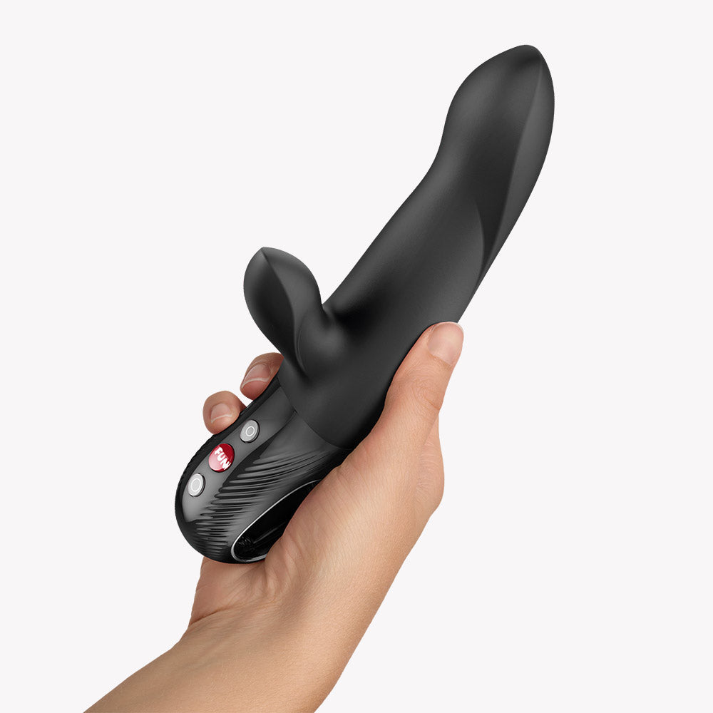 Fun Factory Bi Stronic Arc Vibrator Black held in hand, showcasing ergonomic design and controls.
