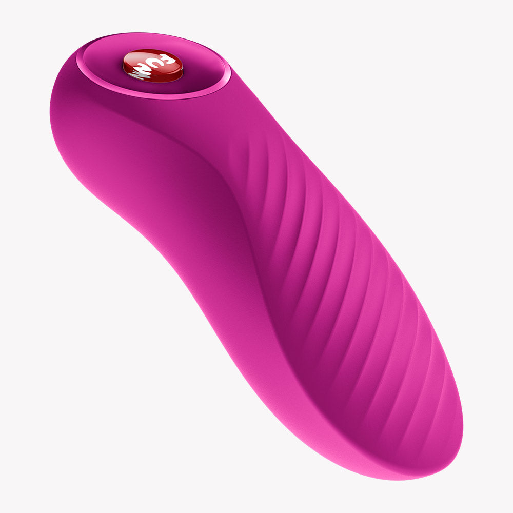 Fun Factory Bijou Bullet Vibrator Magenta featuring a wavy texture and compact design for portability.