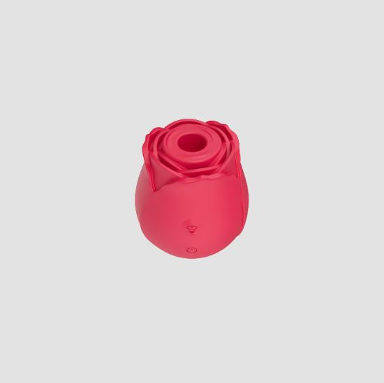 Sweet Dreams Rose True Suction Clitoral Stimulator in vibrant pink with rose-shaped design.