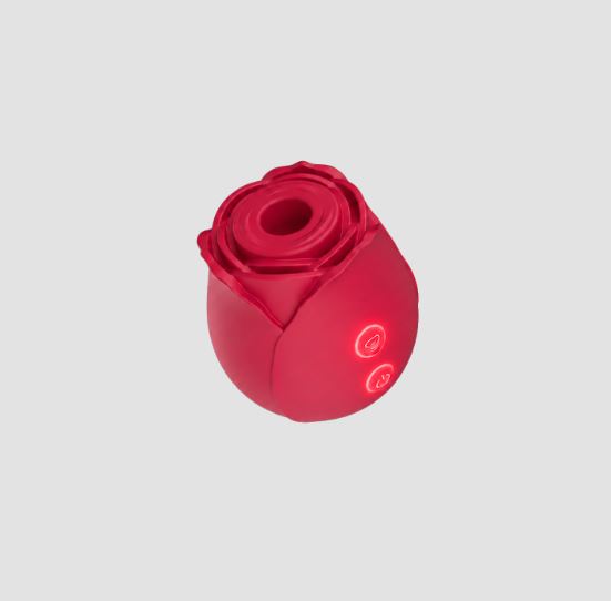 Sweet Dreams Rose True Suction Clitoral Stimulator in vibrant red color with control buttons.