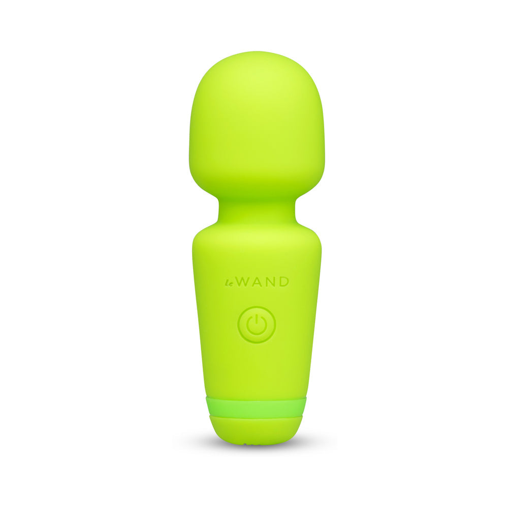Le Wand Essentials Mini Wand Vibe Pocket-sized Vibrator in vibrant green color, compact and ready for portable pleasure.