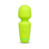 Le Wand Essentials Mini Wand Vibe Pocket-sized Vibrator in vibrant green color, compact and ready for portable pleasure.