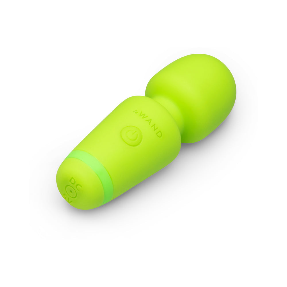 Le Wand Essentials Mini Wand Vibe Pocket-sized Vibrator in bright green color, compact design for easy portability.
