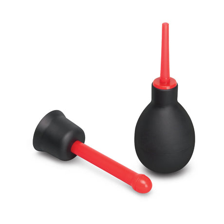 b-Vibe Essentials Mini Travel Enema Set 30 ml with black bulb and red nozzle for portable anal hygiene.