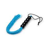 B-vibe Essentials Beaded Flogger with blue tassels and black beads, perfect for sensation play.