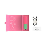 Womanizer Beauty Air Pulse Stimulator Green & Pink in packaging with quick guide and charging cable.