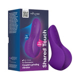 We-Vibe Shared Touch Couples Grinding Vibrator Purple in packaging showcasing its ergonomic design for shared pleasure.