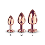 Dorcel Diamond Butt Plug Rose Gold Medium displayed alongside small and large sizes for comparison