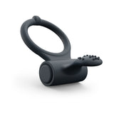 Dorcel Power Clit Plus Vibrating Cockring displayed on a white background, featuring clitoral stimulator and snug fit.