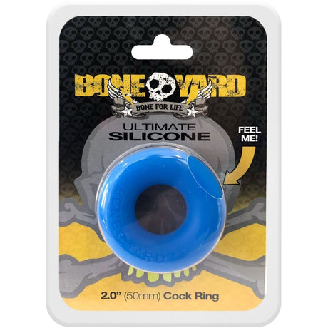 Boneyard Ultimate Silicone Cock Ring Blue packaged on a black and yellow background, showcasing its premium design.