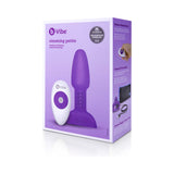 b-Vibe Rimming Petite Remote Control Butt Plug Purple packaging with remote and product details.
