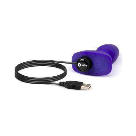 b-Vibe Rimming Petite Remote Control Butt Plug Purple with USB charging cable for easy power.