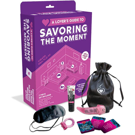 A Lover's Guide To Savoring The Moment Oral Kit displayed with accessories for couples' intimacy and pleasure exploration.