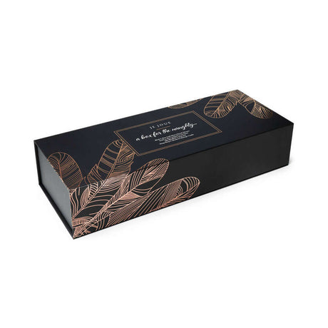Je Joue The Naughty Collection 4-piece Gift Set elegantly packaged in black box with rose gold feather design.