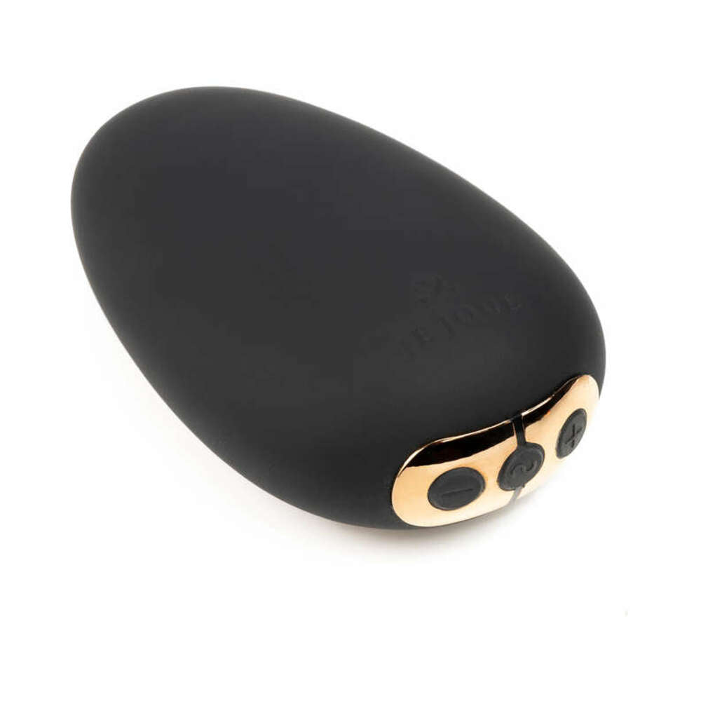 Je Joue The Naughty Collection 4-piece Gift Set black vibrator with gold accents and buttons