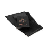 Je Joue The Naughty Collection 4-piece Gift Set featuring silk blindfold and restraint.