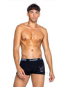 Playboy Mens Tuxedo Boxer Brief Large Black/White modeled by a man, showcasing the stylish design and comfort.