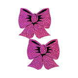 Pastease Bow Hot Pink Glitter Bows Nipple Pasties in sparkling hot pink glitter, adding playful allure to outfits.
