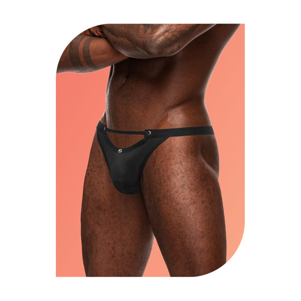 Wow Magnificence Micro V Thong Black S/M displayed on a model, highlighting the bold design and hardware details.