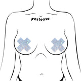 Pastease Crystal Sparkling Crosses Pasties Silver on a body illustration, showcasing sparkling cross-shaped design.