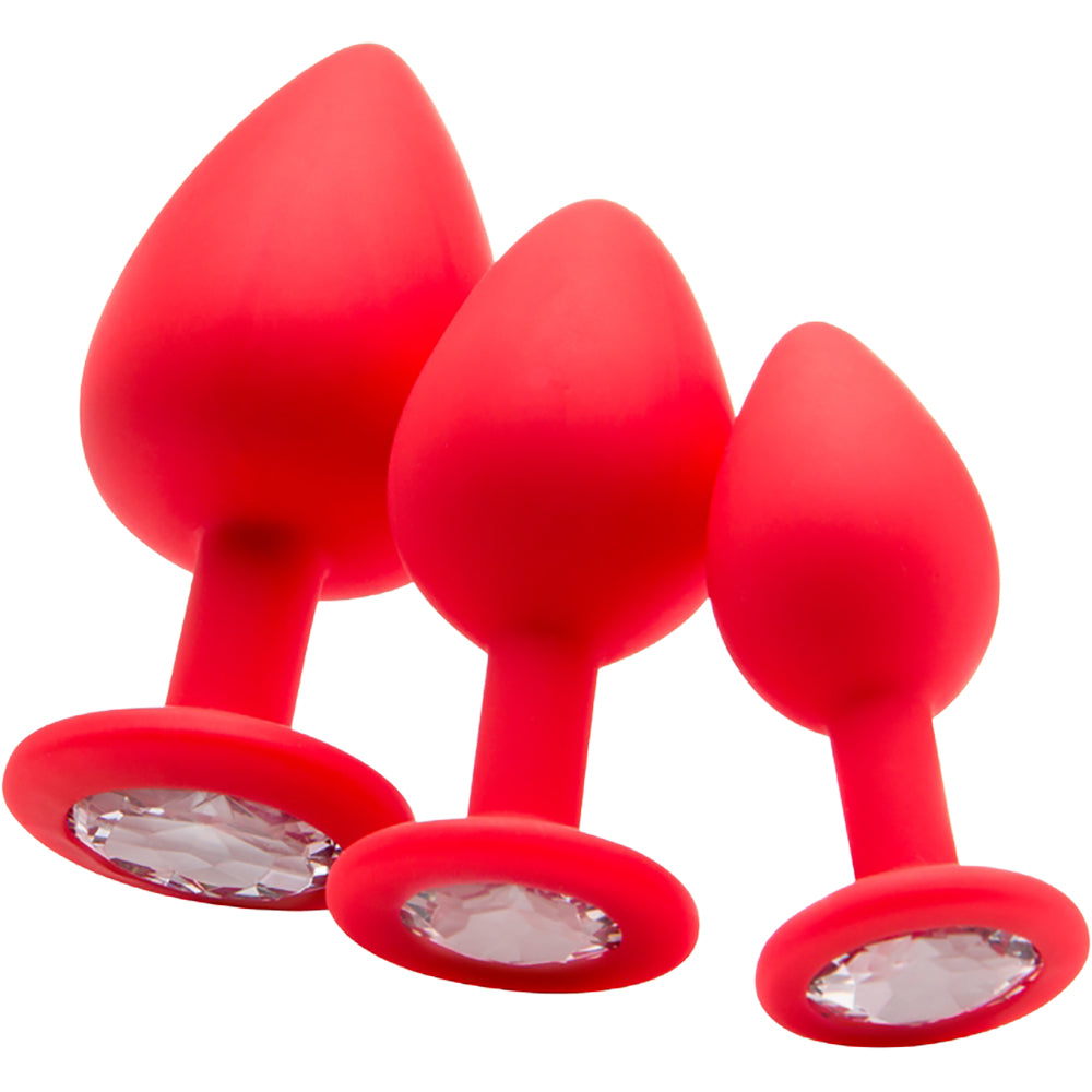 Ouch Regular Diamond Butt Plug Red set of three, featuring smooth silicone and diamond-shaped bases for anal play.