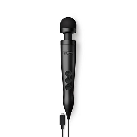 Doxy Usb-c Wand Massager Matte Black sitting on a surface with USB-C cable.