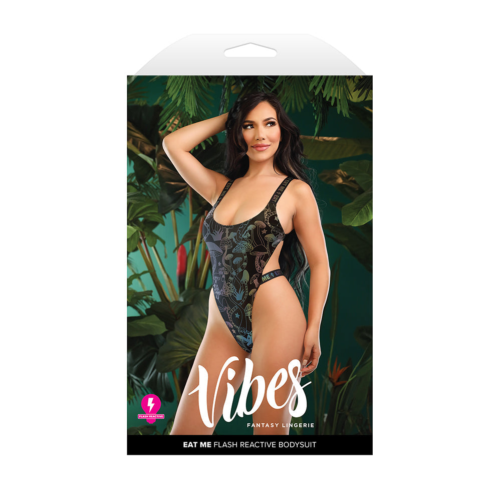 Fantasy Lingerie Vibes Eat Me Mushroom Print Bodysuit S/M on model in tropical setting