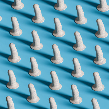 Biird Boo 5.5 Inch Silicone Suction Cup Dildo Blue on a blue background with multiple units.