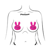 Pastease Pink Marshmallow Easter Bunny Nipple Pasties on a model, showcasing glittery pink bunny design.