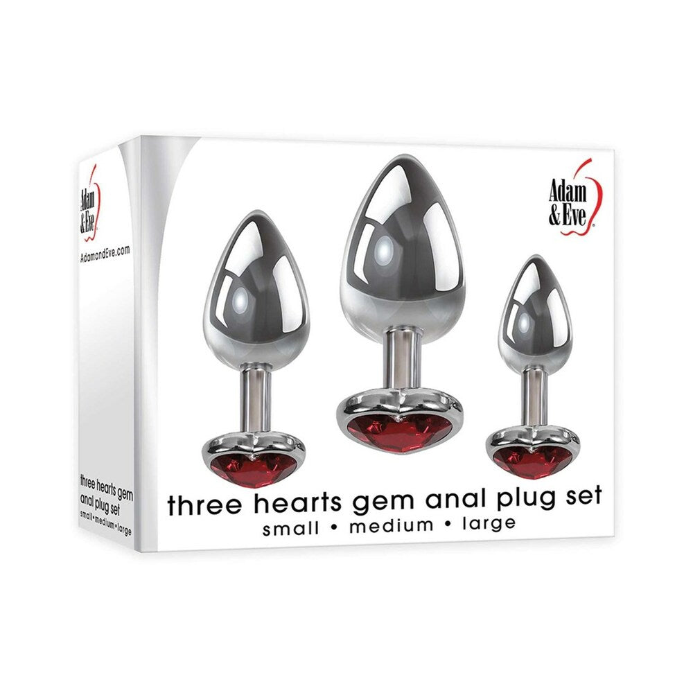 Adam & Eve Three Hearts Gem Anal Plug Set featuring small, medium, and large polished aluminum plugs with red gems.