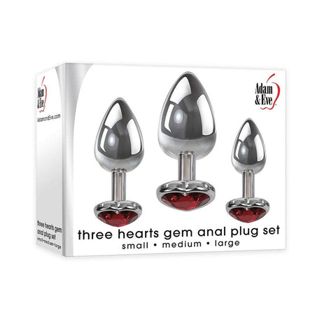 Adam & Eve Three Hearts Gem Anal Plug Set featuring small, medium, and large polished aluminum plugs with red gems.