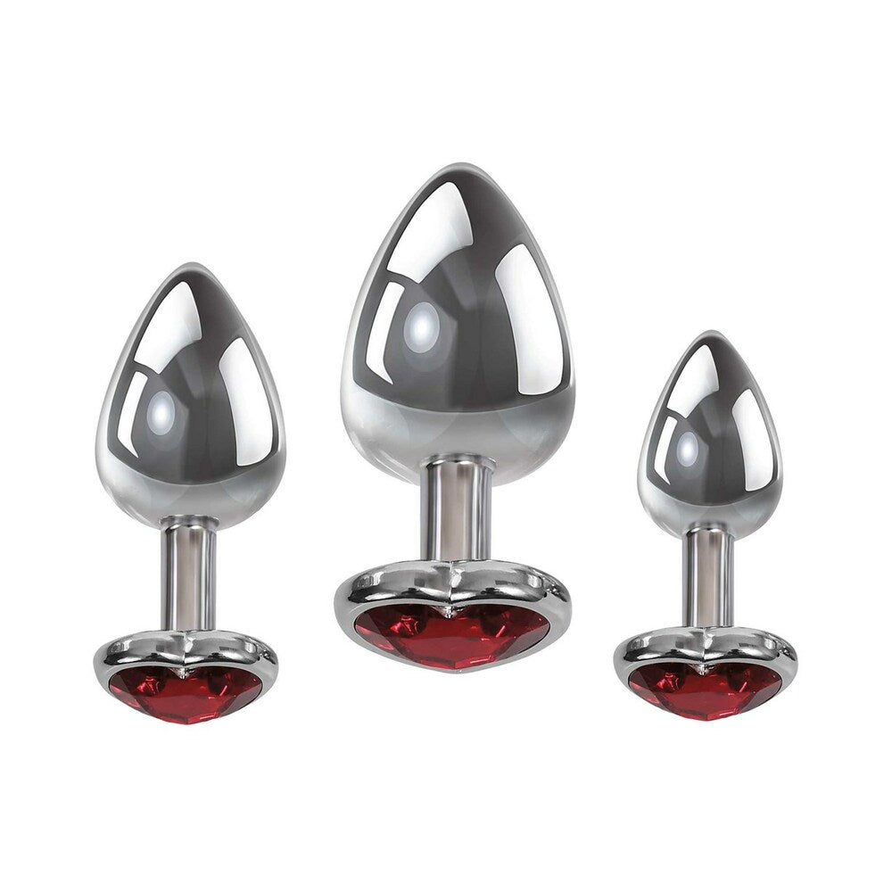 Adam & Eve Three Hearts Gem Anal Plug Set featuring polished aluminum and sparkling red gems in three sizes.