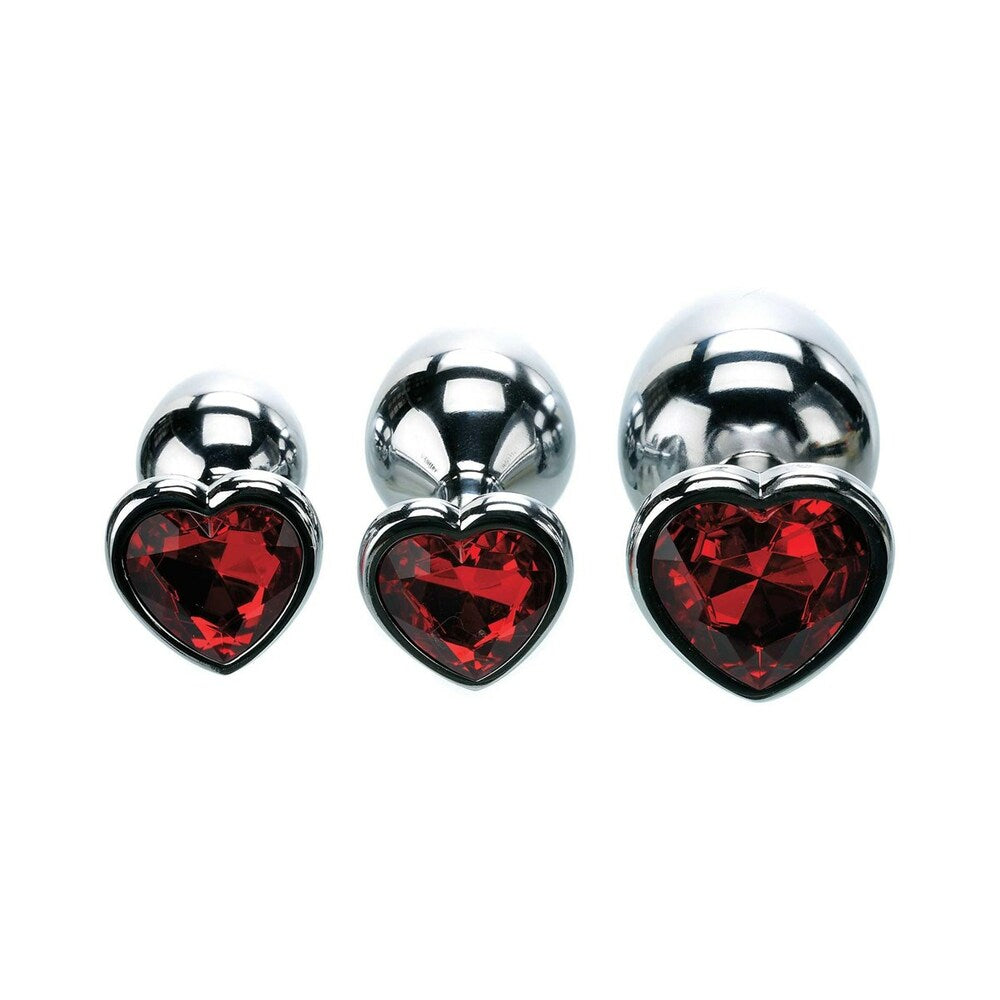 Adam & Eve Three Hearts Gem Anal Plug Set featuring polished aluminum with sparkling red heart gems.