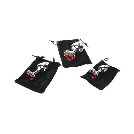 Adam & Eve Three Hearts Gem Anal Plug Set showcased in elegant black pouches with polished aluminum and red gems.