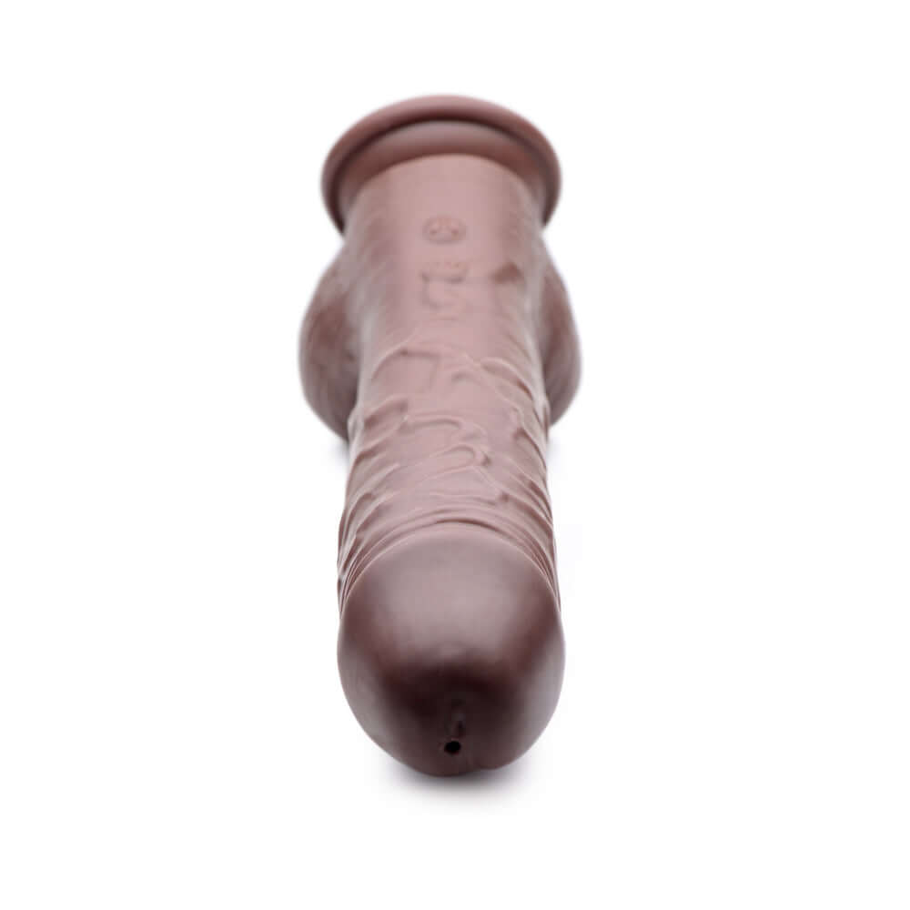 Loadz 8.5 inch Vibrating Squirting Dildo Dark close-up view showcasing realistic design and texture.