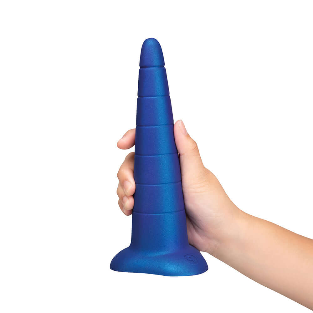 b-Vibe Anal Stretcher Training Cone held in hand, showcasing its cone shape for gradual anal training.