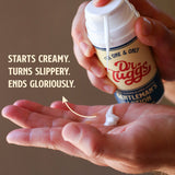 Dr Tuggs Gentleman's Masturbation Lotion 3.4 Oz being dispensed onto a hand with a creamy texture.