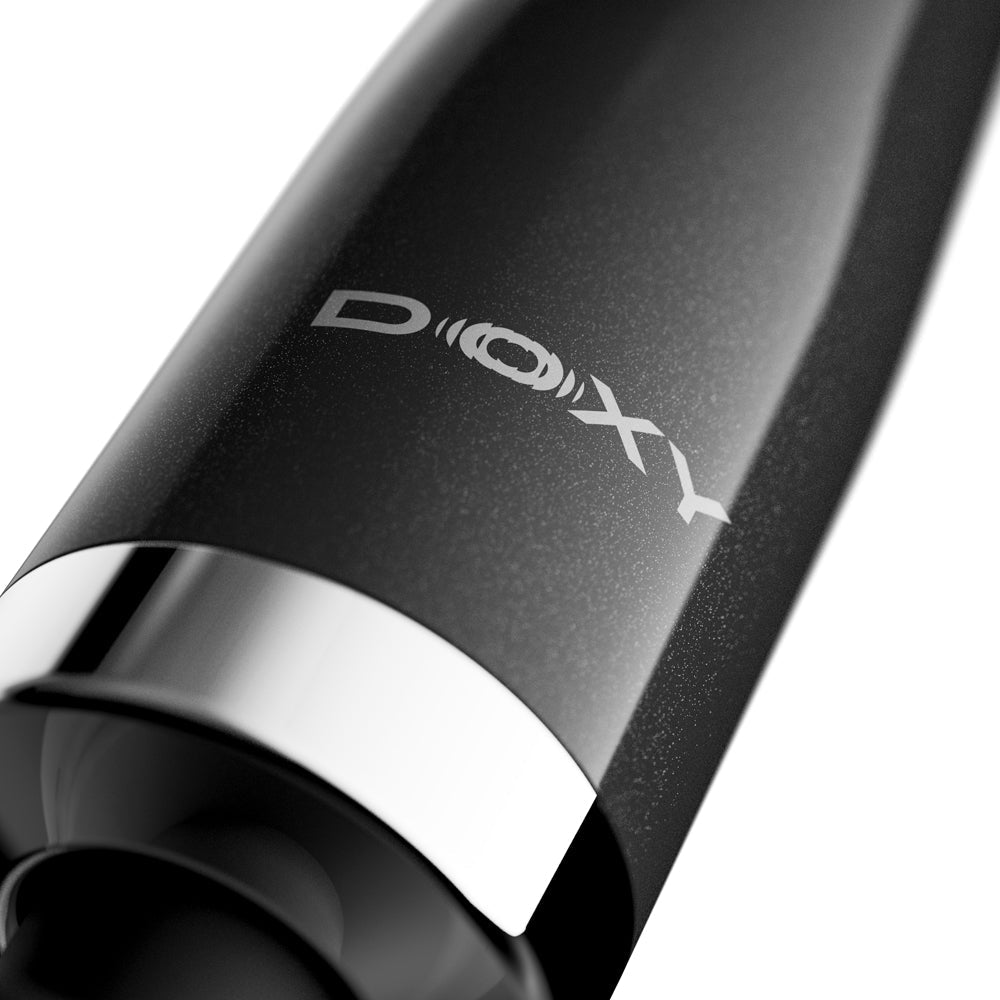 Close-up of the Doxy Die Cast Max Plug-in Wand Massager Black showcasing its sleek black finish and Doxy logo.
