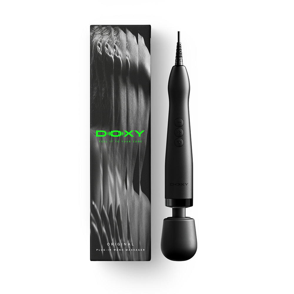Doxy Original Wand Massager Black next to its packaging, showcasing its sleek design and powerful features.