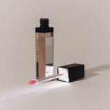 Eye Of Love Matchmaker Pink Pulse Pheromone pH Lip Stain in sleek packaging with applicator.