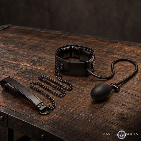 Master Series Constrict Inflatable Collar with Leash Black on wooden table with chain leash.